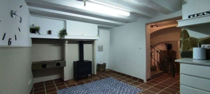 Kitchen with log-burning stove